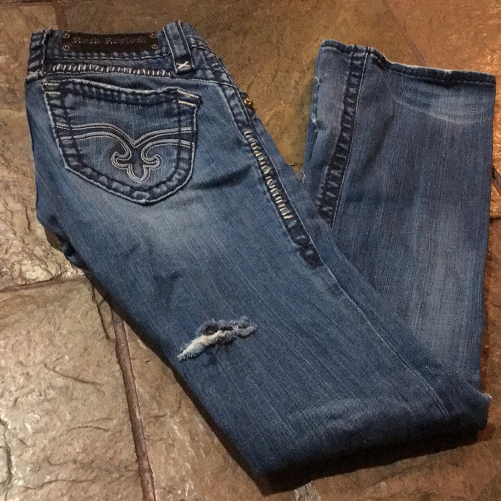 BUCKLE REVIVAL WOMEN’S BOOT CUT STRETCH JEANS.